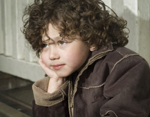 Young Child Looking Sad