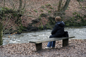 Woman Sitting Alone